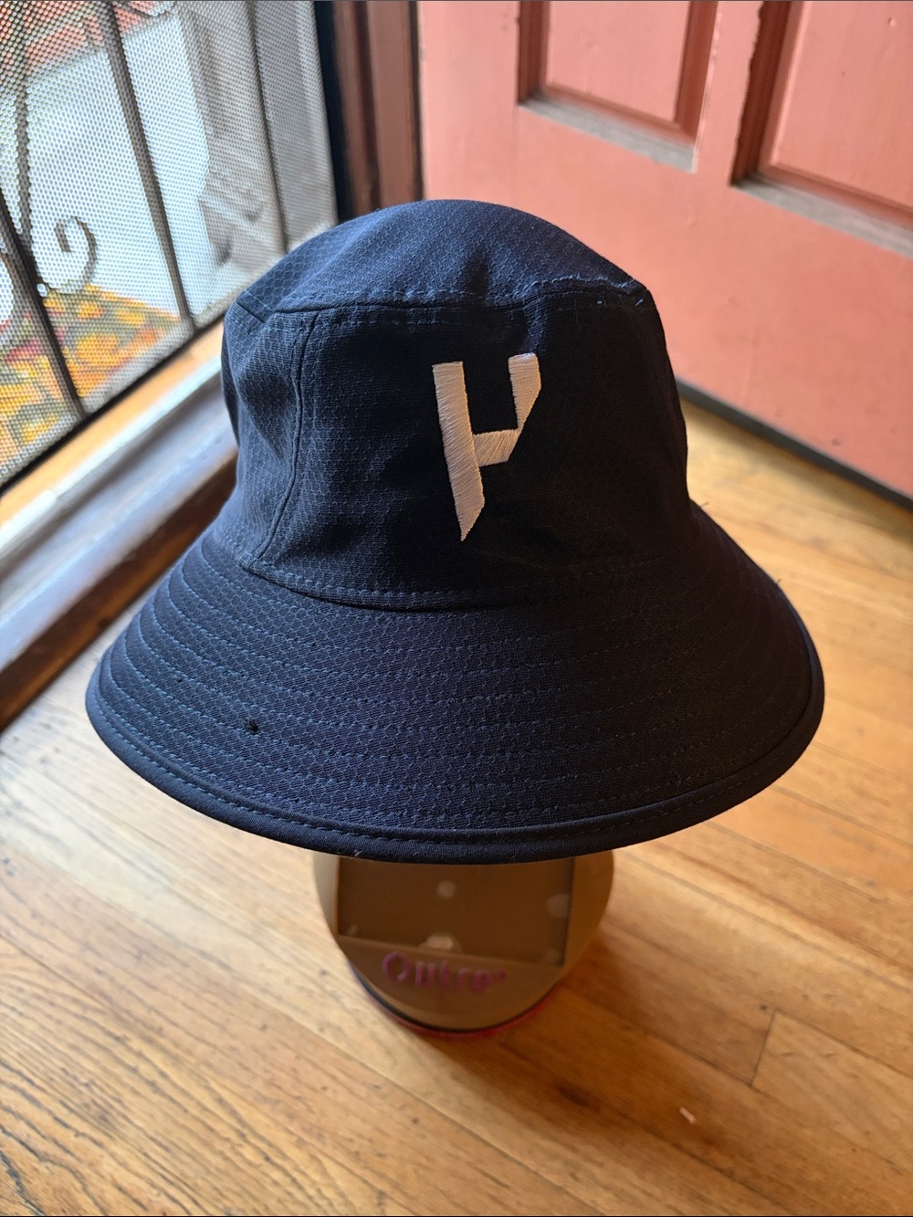 New Era Black Bucket Hat with White Logo Label